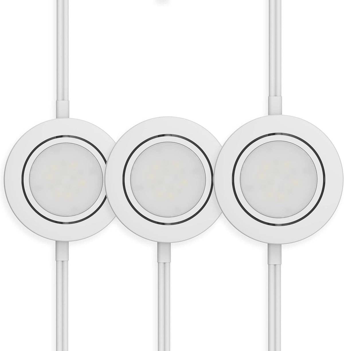 Three white round puck lights with connecting cables