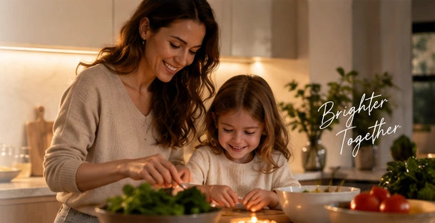 Illustrative family cooking scene in a warmly lit kitchen.